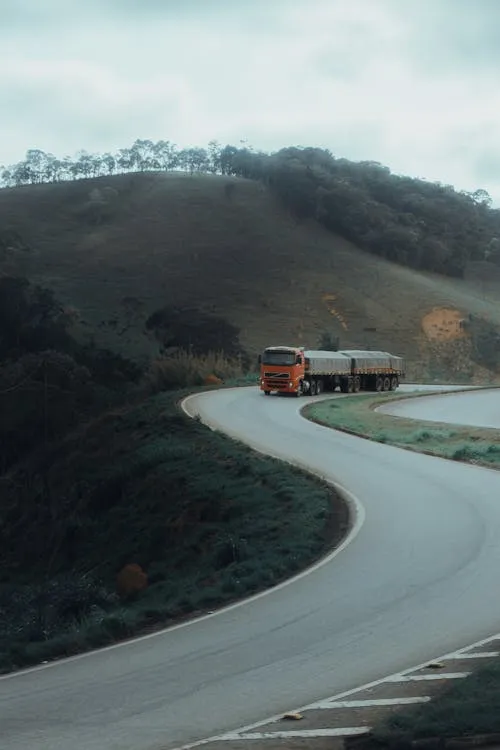 A truck racing across the highway.