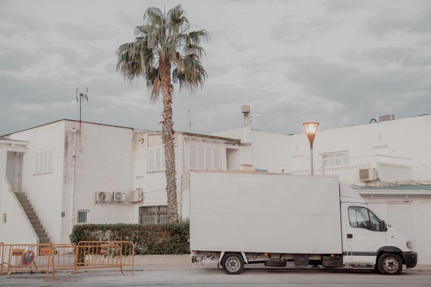 A picture of  a truck on the road