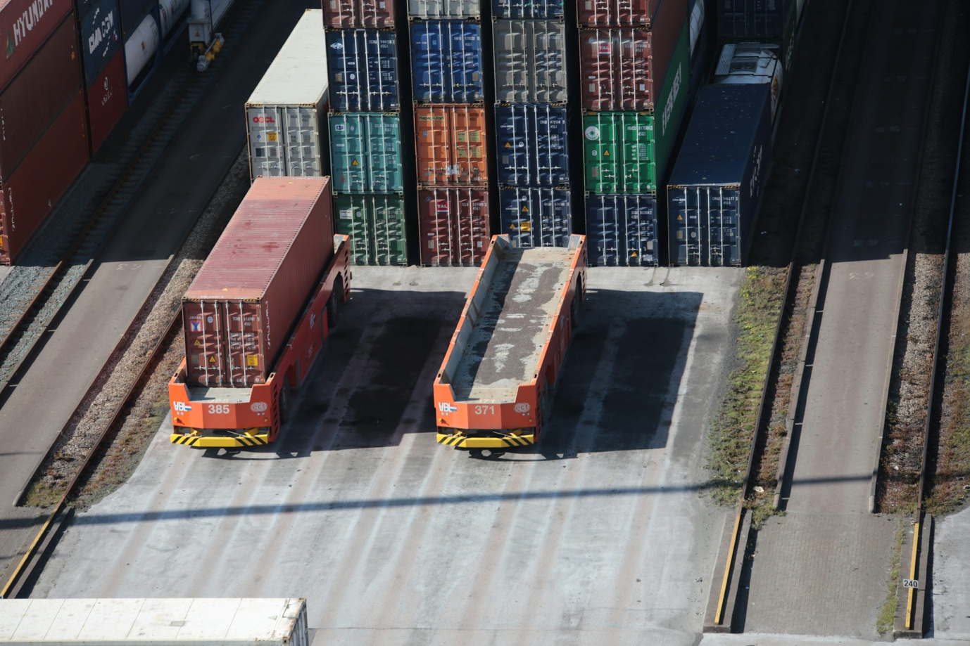 Cargo trucks and containers at a port
