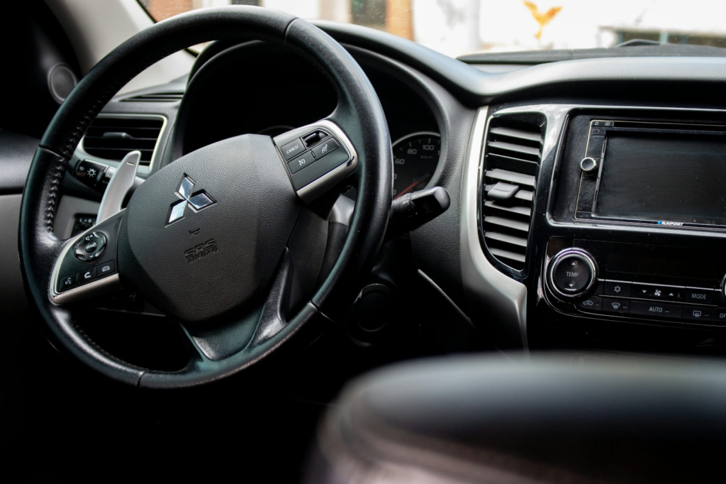 A man behind a steering wheel