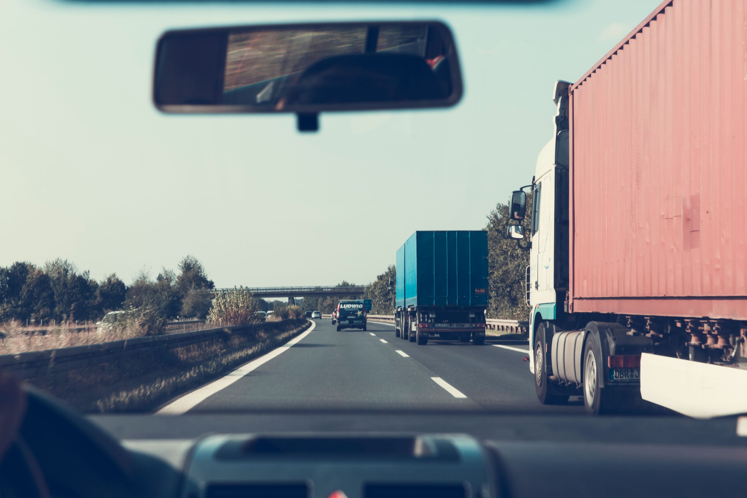 First-time CDL student receiving hands-on instruction from an experienced truck driving instructor